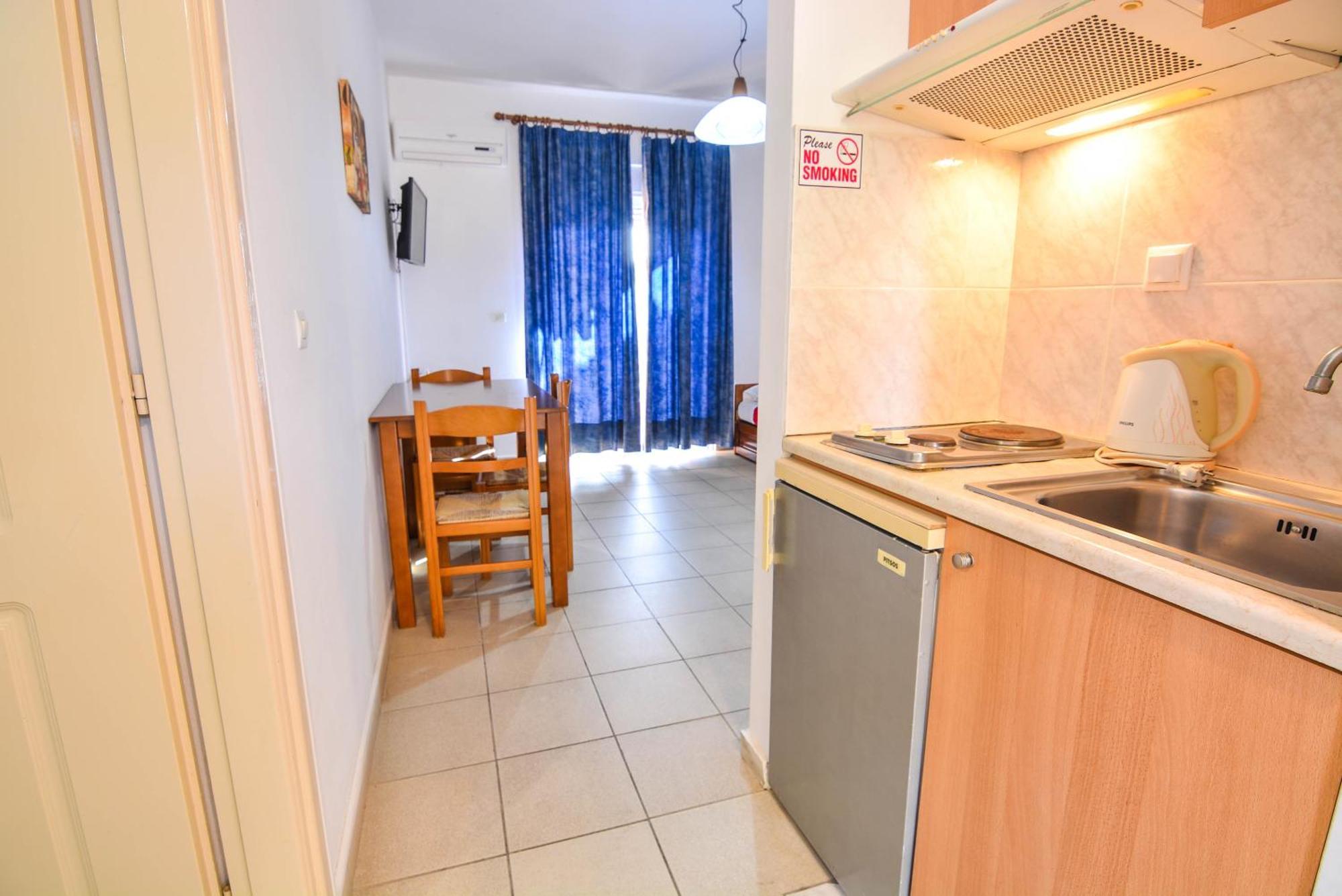 Epavlis Apartments Порто-Хелі Екстер'єр фото