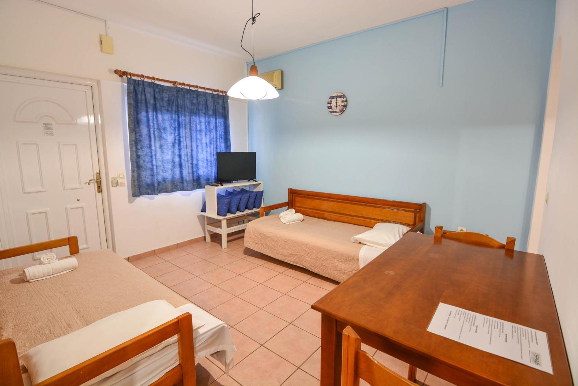 Epavlis Apartments Порто-Хелі Екстер'єр фото
