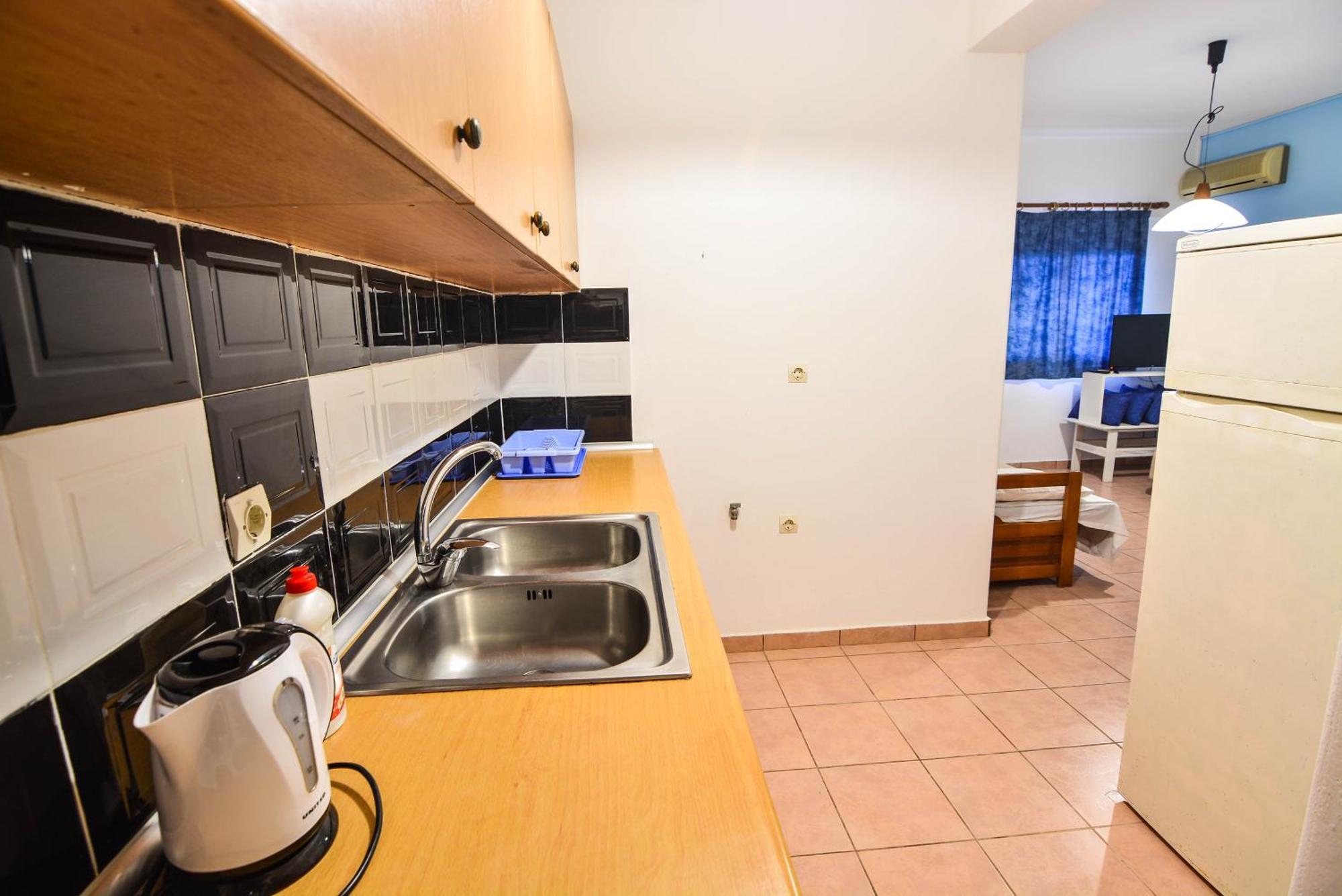 Epavlis Apartments Порто-Хелі Екстер'єр фото